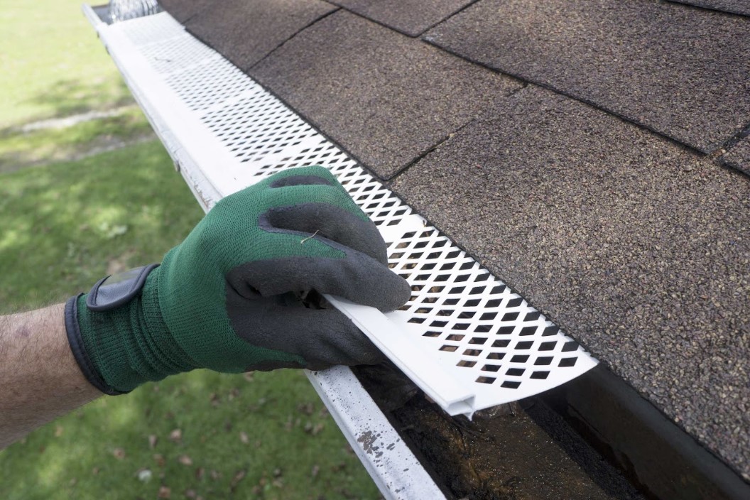 gutter cleanout and guard installation