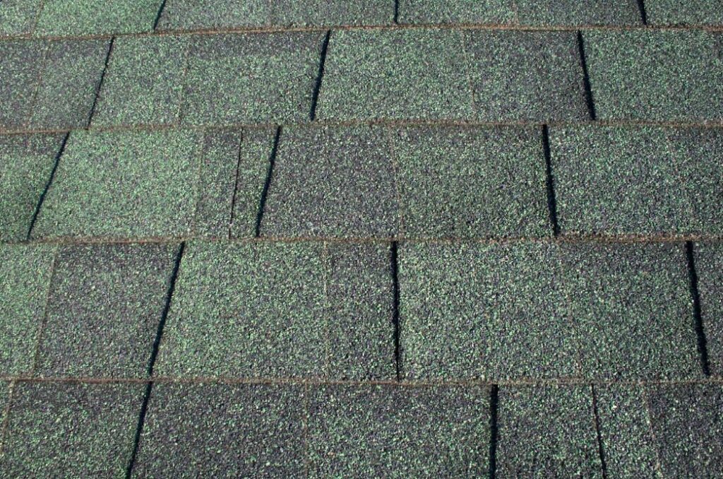 wind and hail damage on roof in West Central Indiana